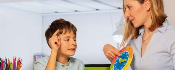 A teacher with student during literacy class