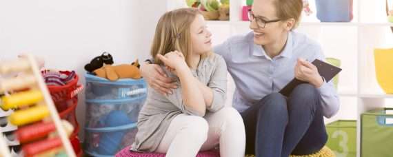 Teacher having a conversation with a student