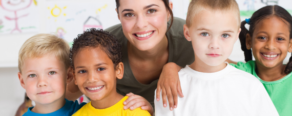 A teacher with a diverse group of students